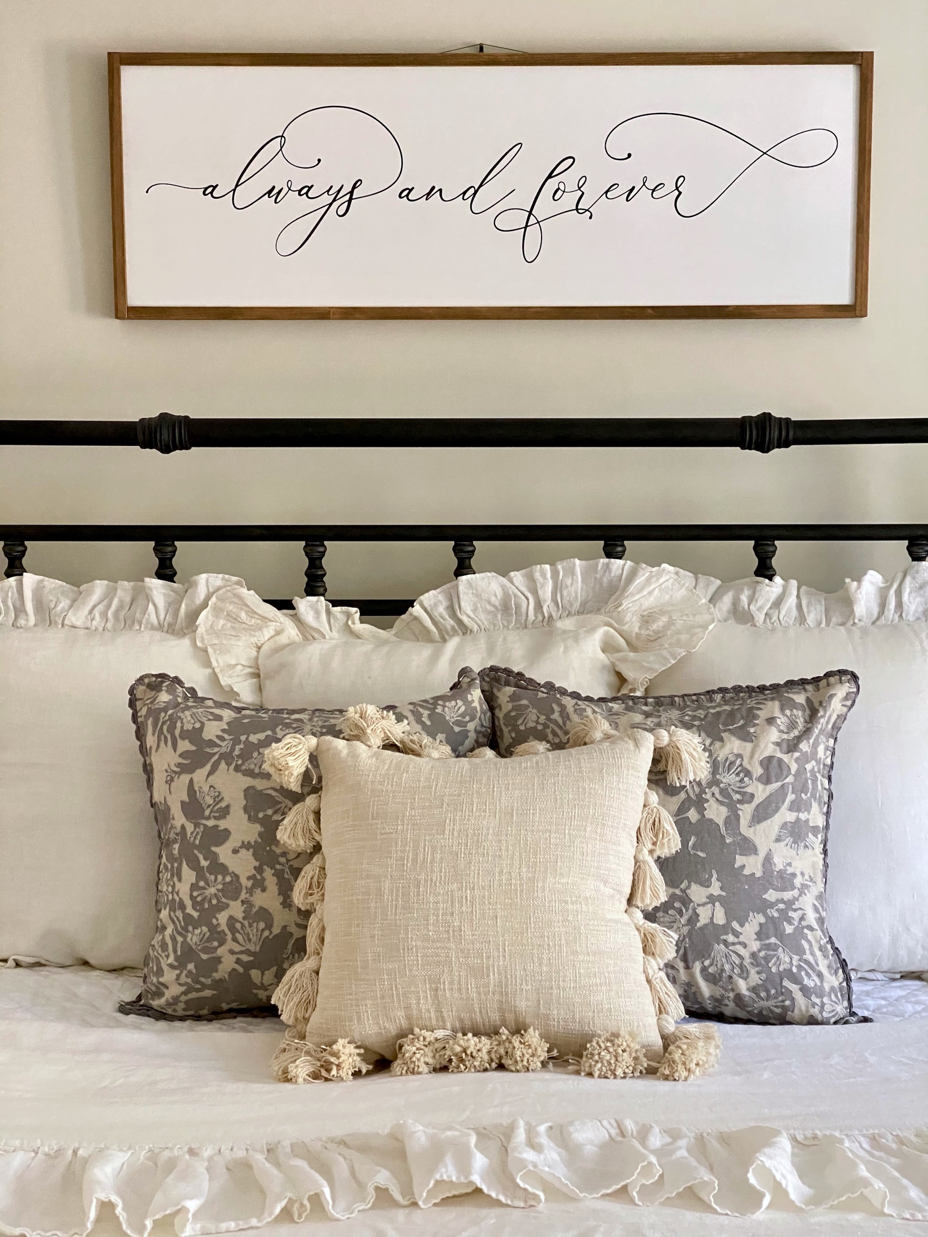 Beautiful throw pillows on the bed from Wayfair.