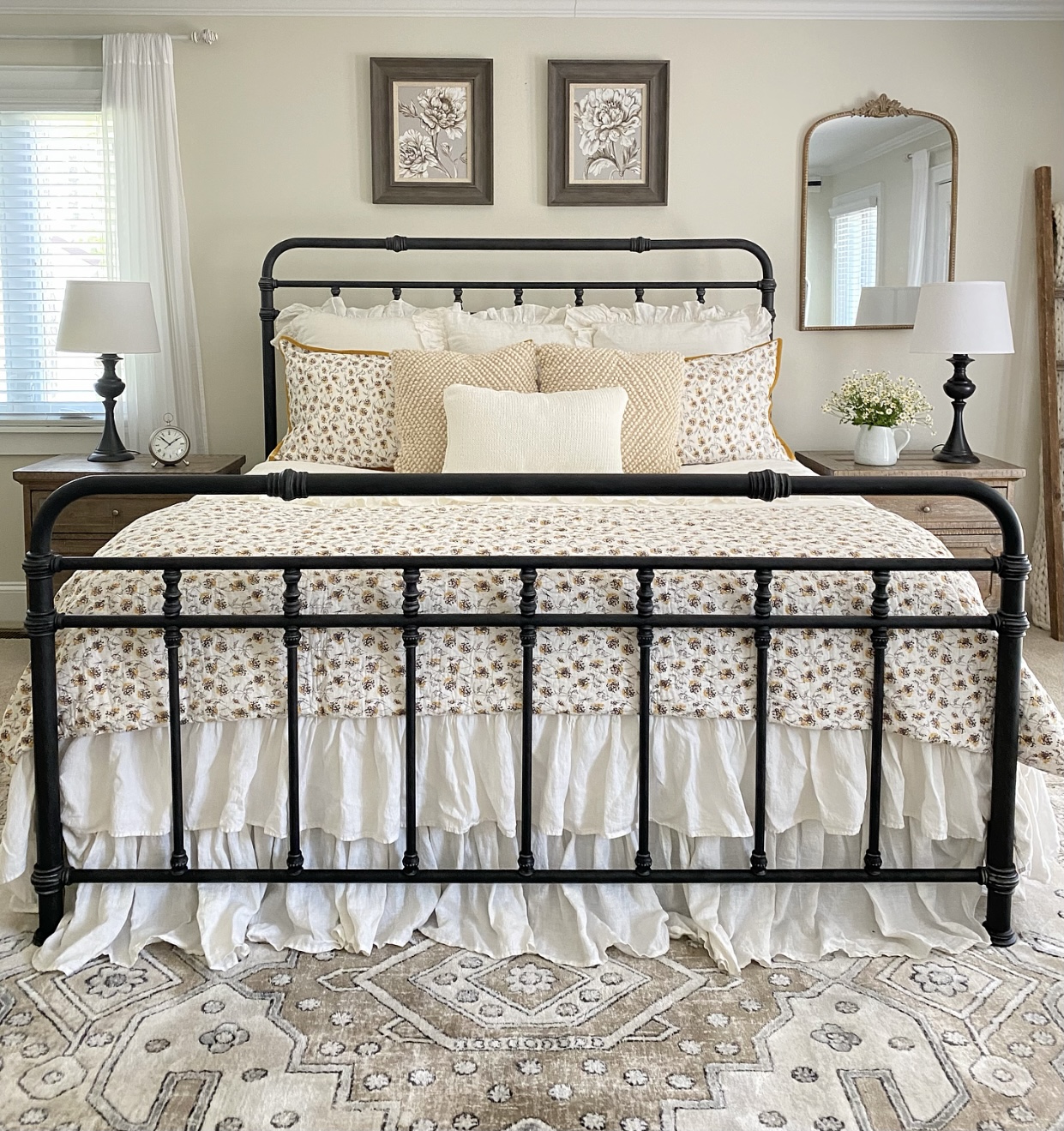 Late Summer Farmhouse Bedroom with black iron bed, a neutral color palette, and beautiful textures.