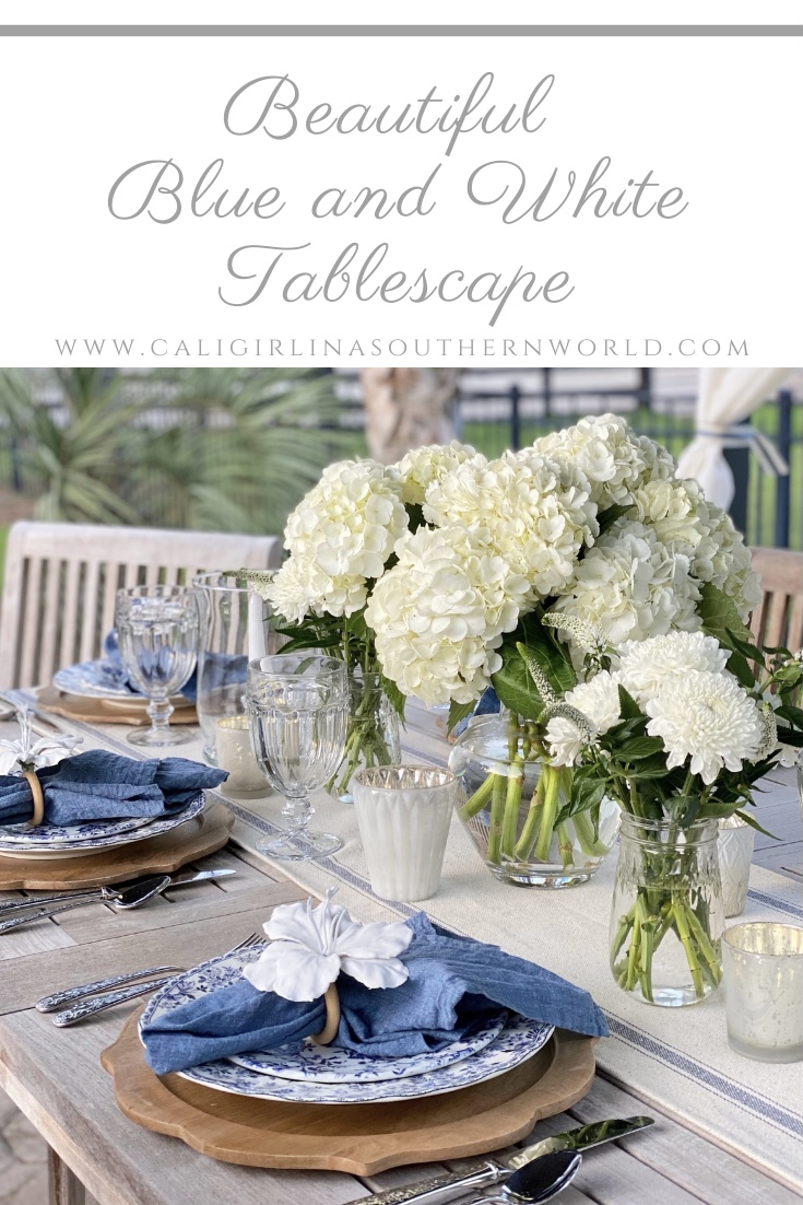 Pinterest Pin of beautiful blue and white tablescape.