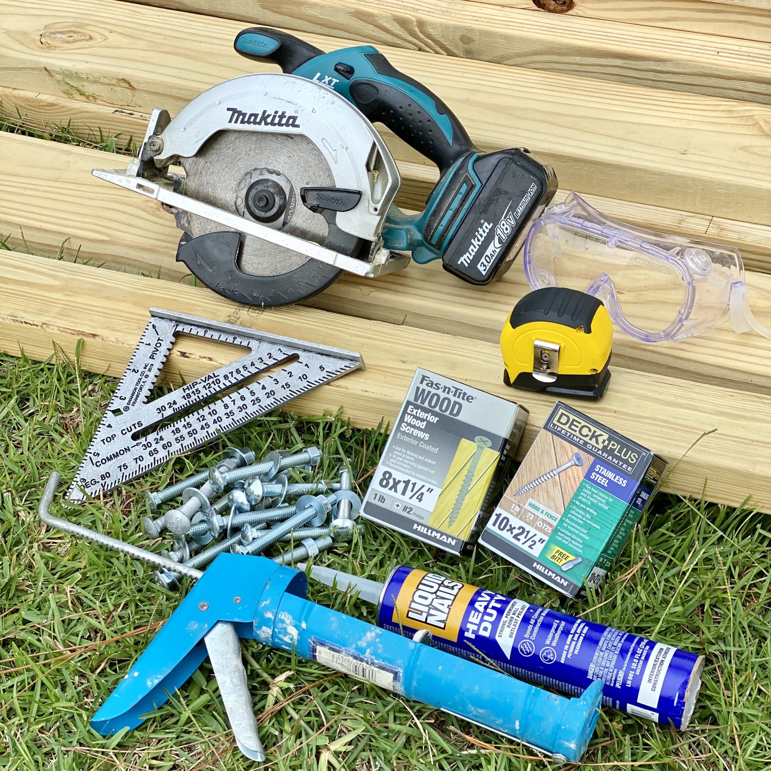 Materials and tools you need to build a picnic table including wood boards, saw, screws, and more.