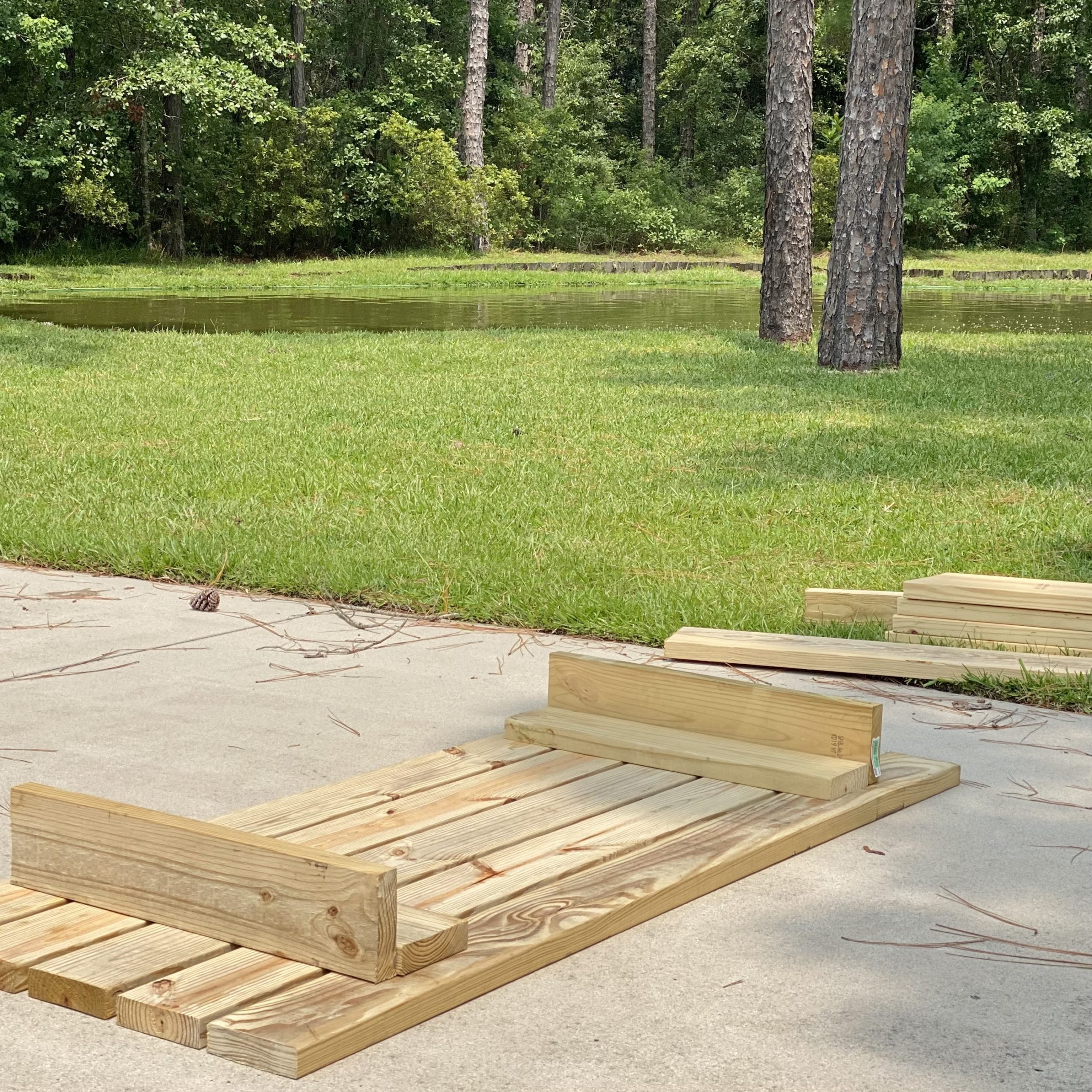 Tabletop on the driveway with top leg supports.