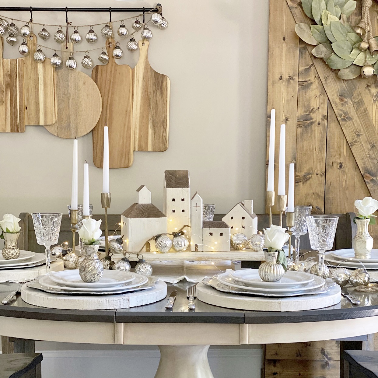 Tablescape for the holidays that is designed with neutral tones of gold, silver, white and wood. Find all the details, styling tips, and sources on the blog.