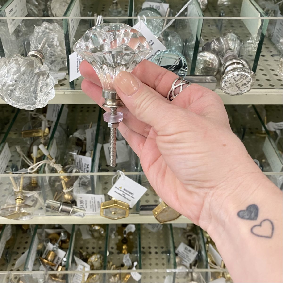 Holding a faux glass knob from Hobby Lobby to use as a topper on my DIY tiered tray jewelry stand.