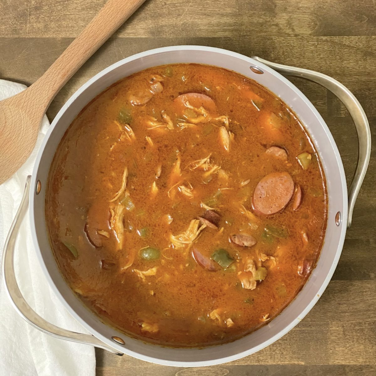 Chicken and sausage gumbo in a pot.