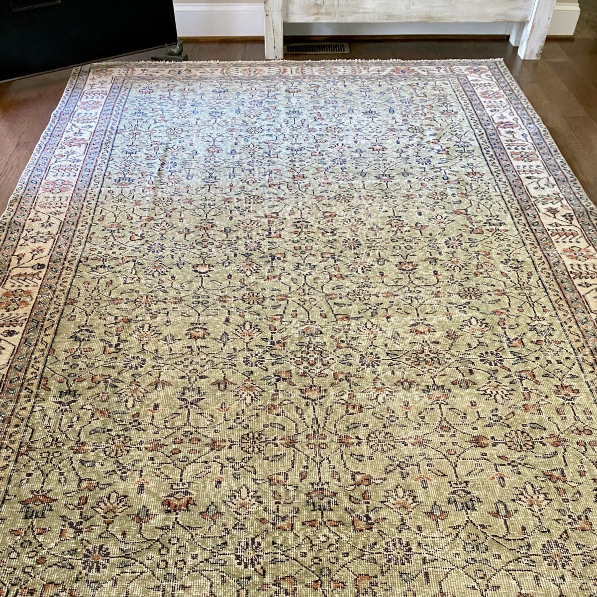 Revival rug laid out on the foyer floor.