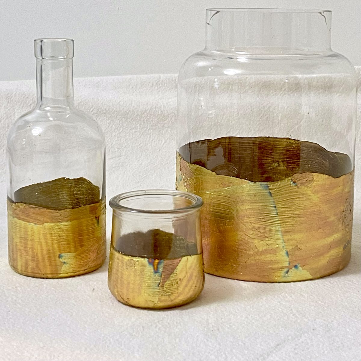 DIY gold leaf vases ready to be displayed.