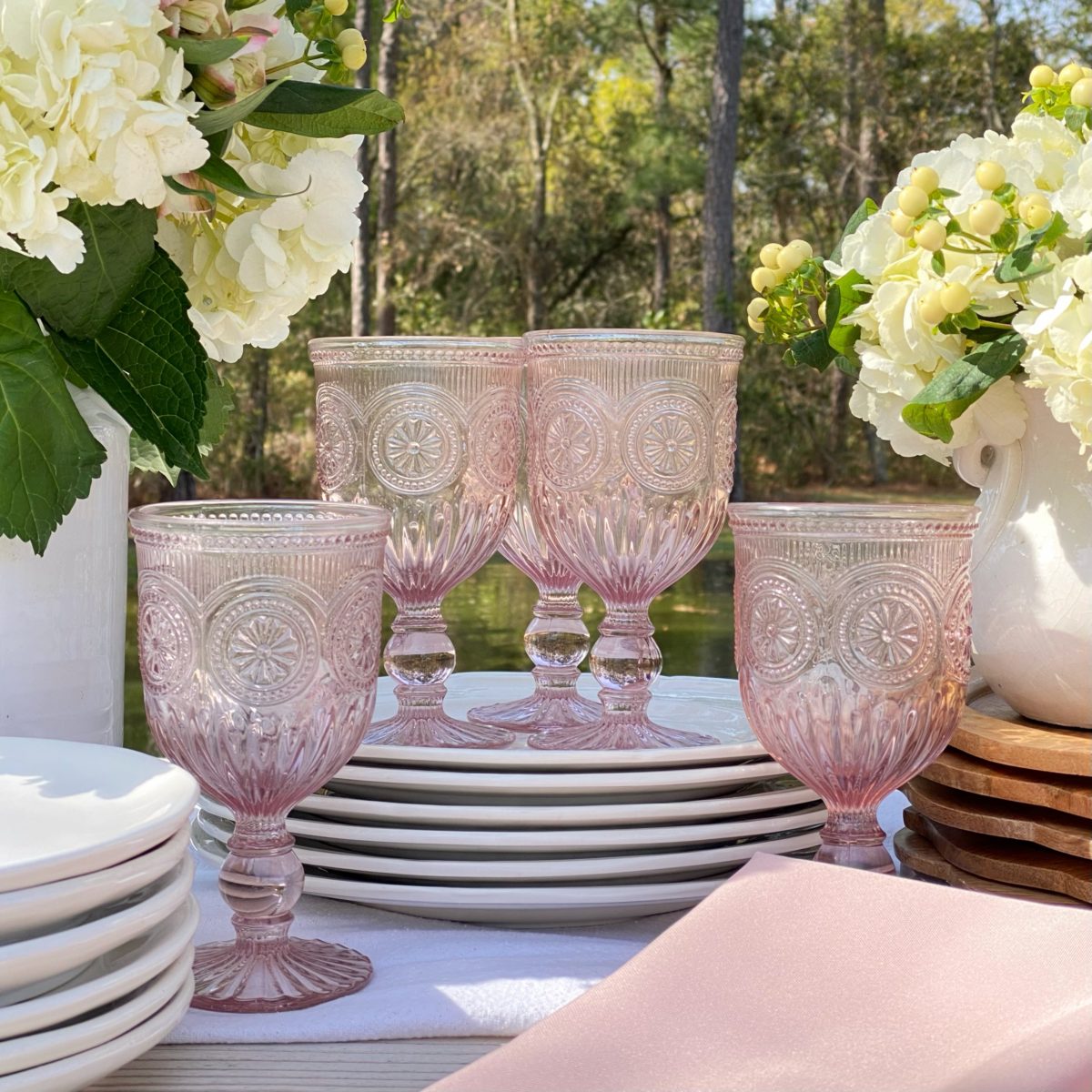 Pink goblets on a table.