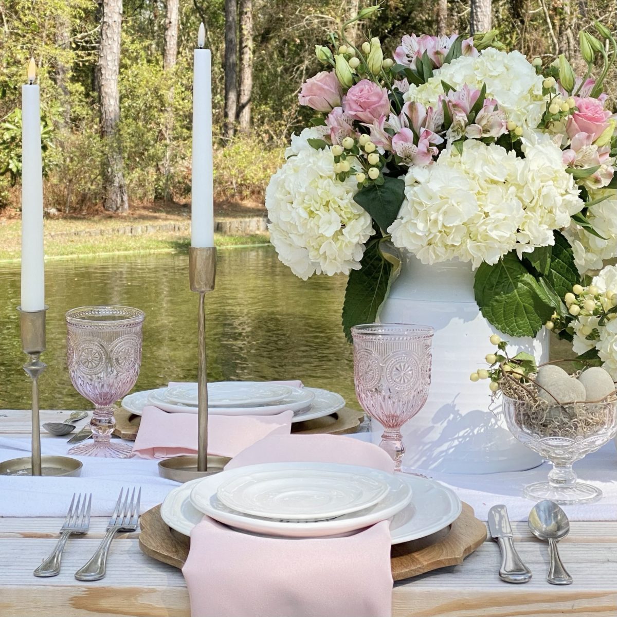 Simple spring table set by the pond.