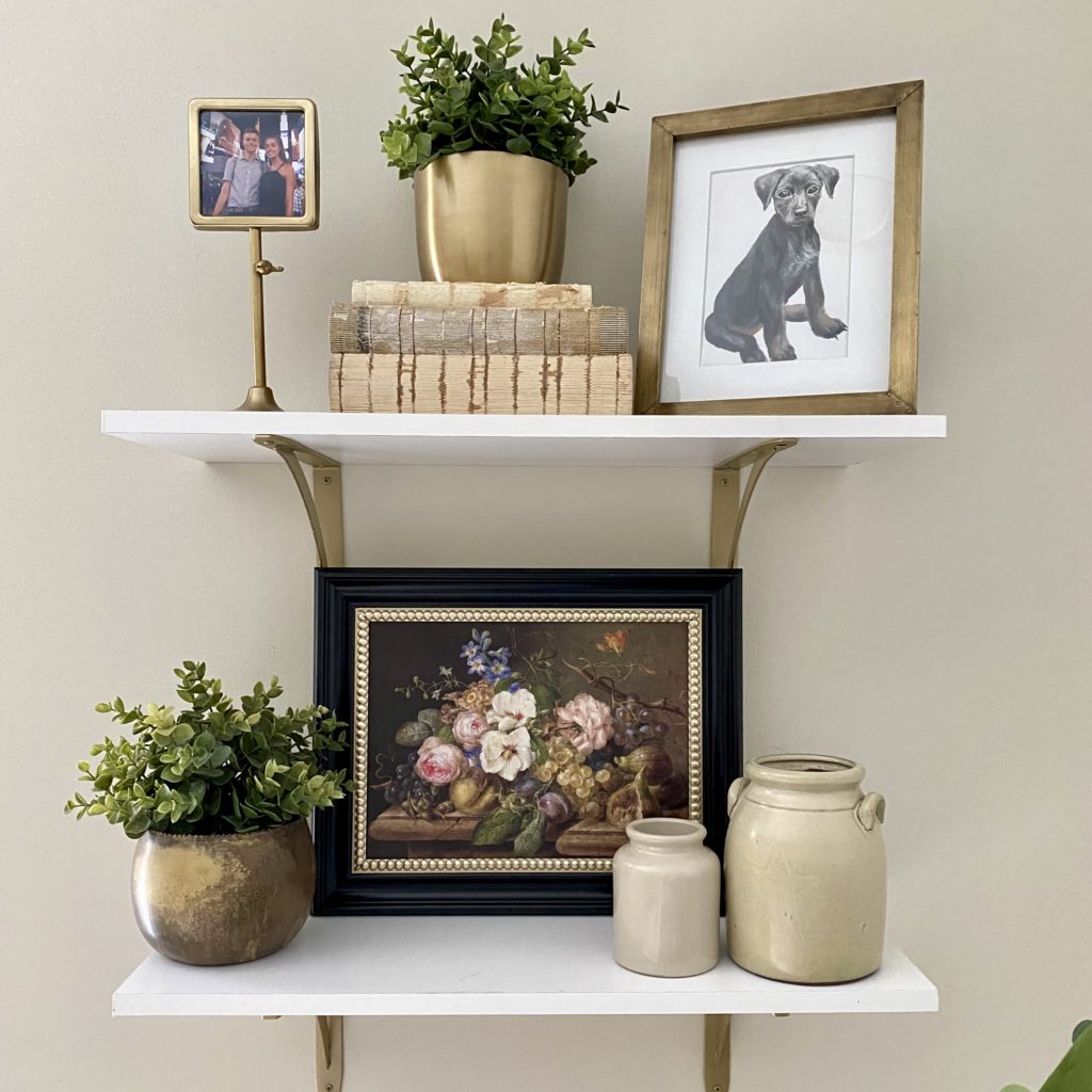 Open shelves Styled with a collection of antique and new pieces to give the shelves old-world character.