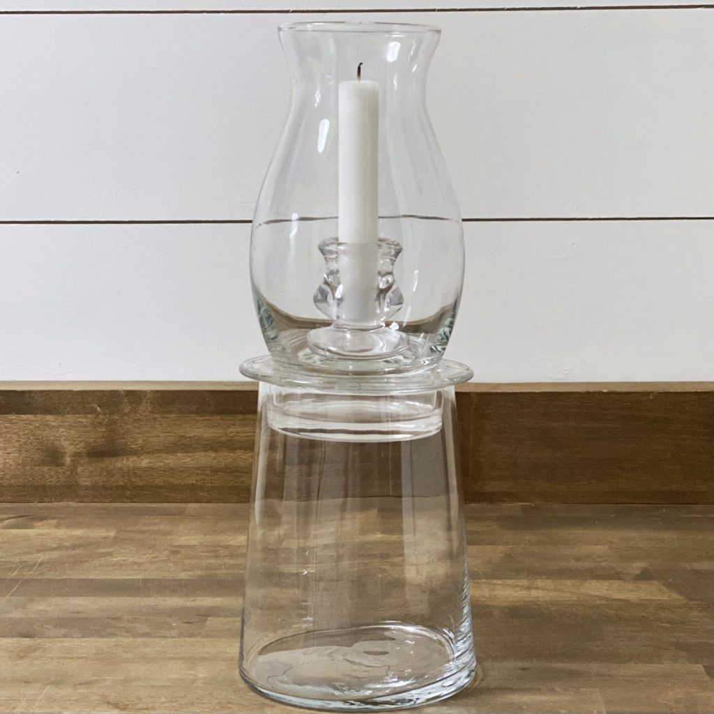DIY glass hurricane lamp complete without the seasonal finishing touches.