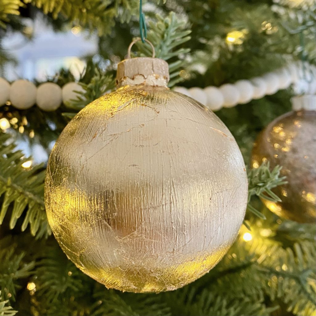 DIY gold leaf ornament on the Christmas tree.