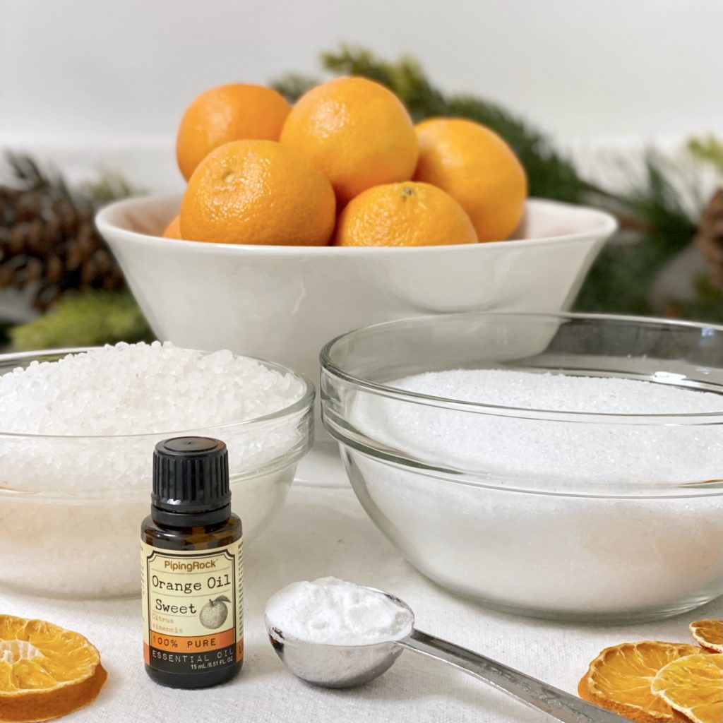 Everything you need to make Relaxing Sweet Orange Bath Salts including sea salt, Epsom salt, sweet orange essential oil,and baking soda.