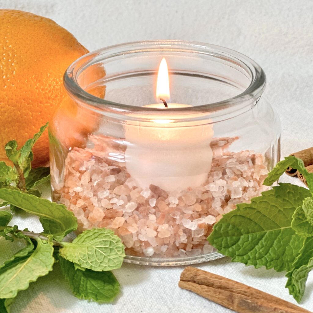 DIY diffuser with Himalayan salt ready with the candle lit.