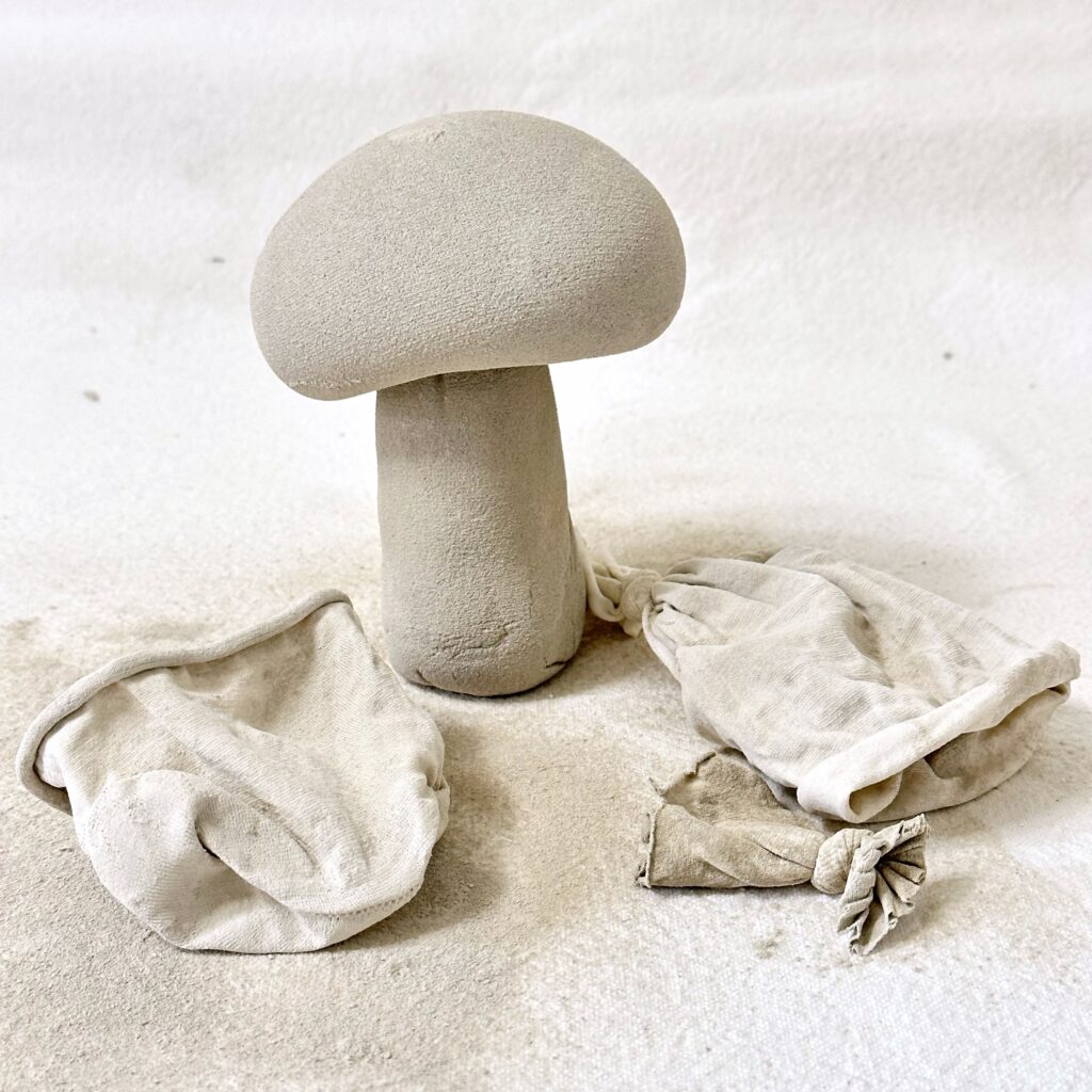 The concrete mushroom cap on the stem to ensure that they are straight and balanced.