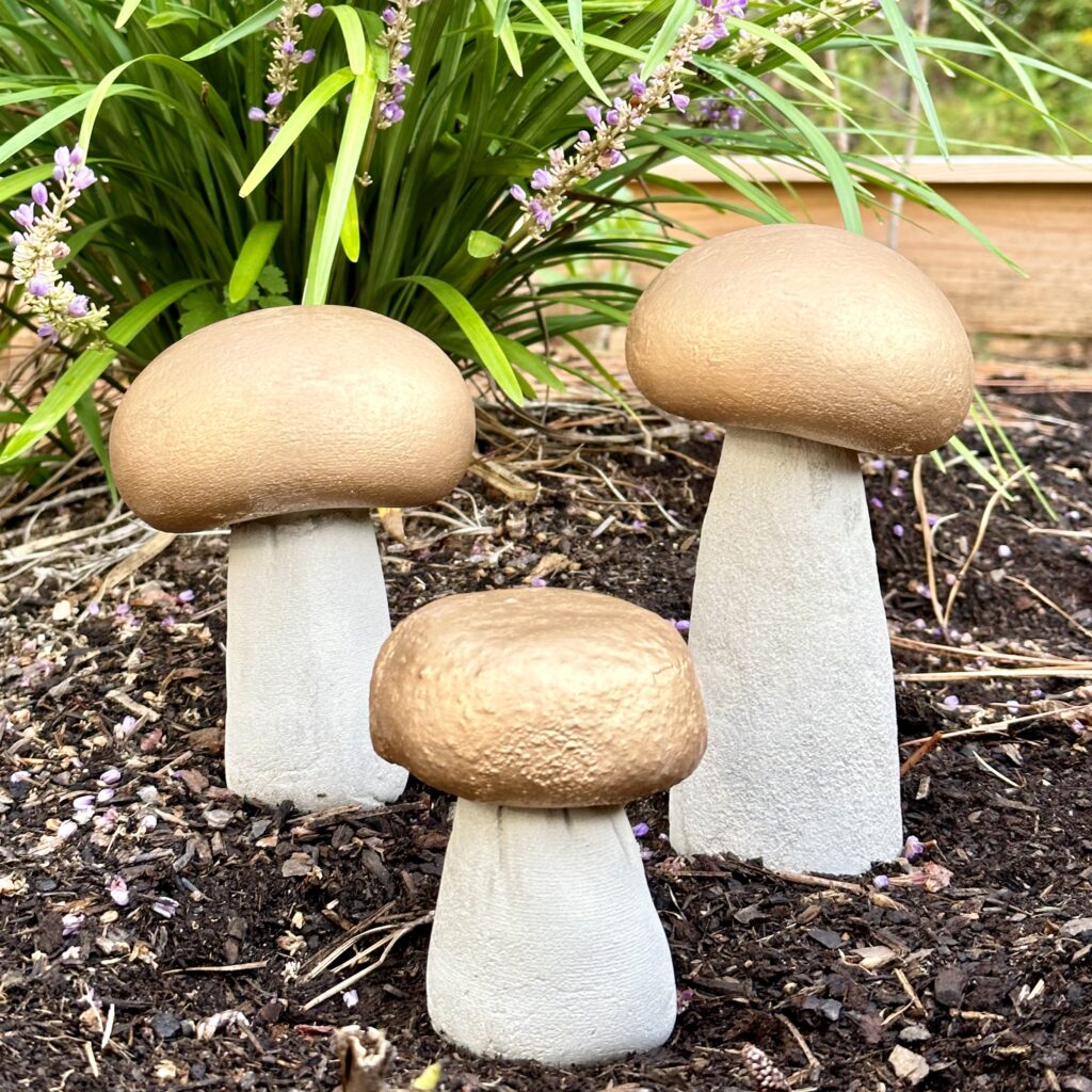 Concrete mushrooms in the garden. 
