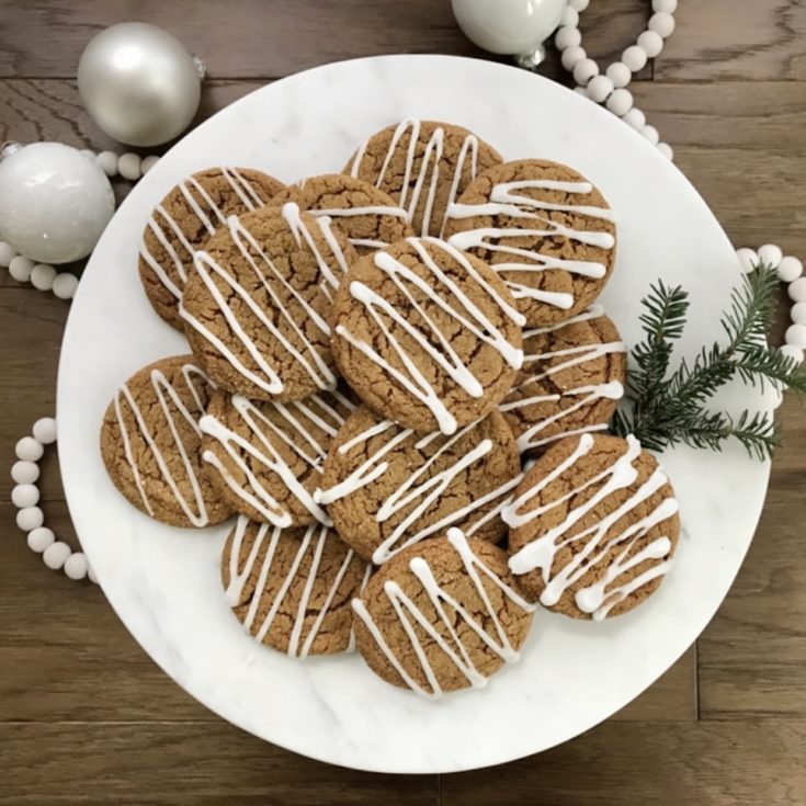 Iced Ginger Cookies on a white plate.